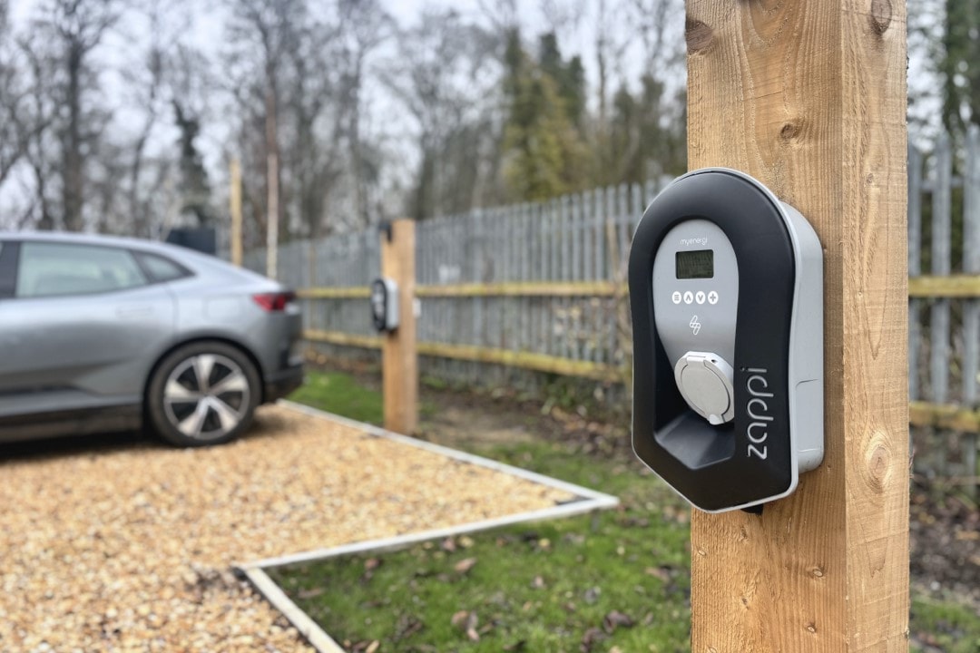 Sustainable building with EV charging on site.